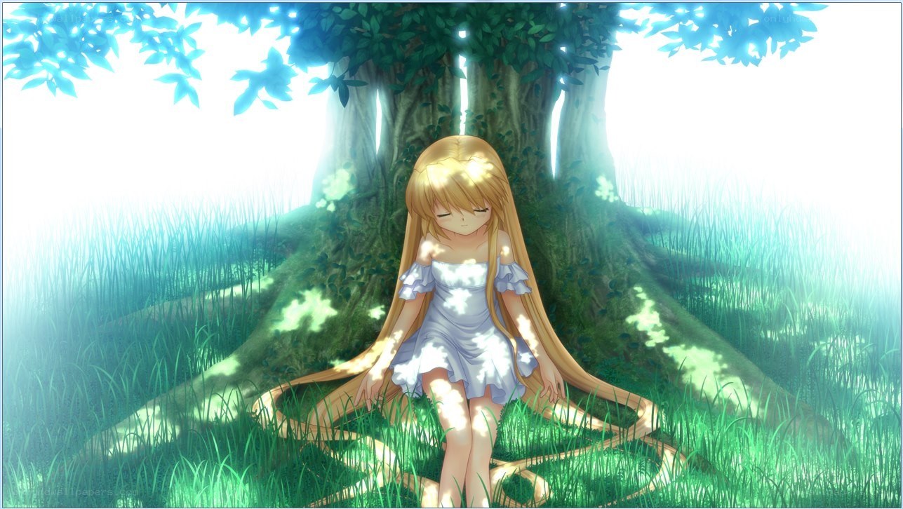 girl sitting under a tree