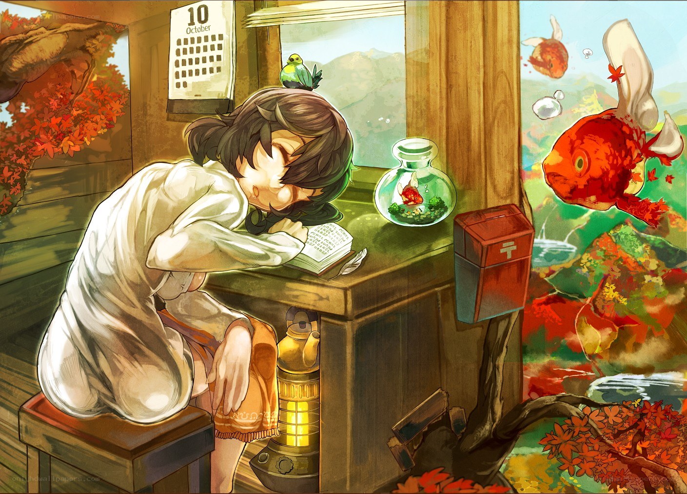 Girl sleeping at desk with fish