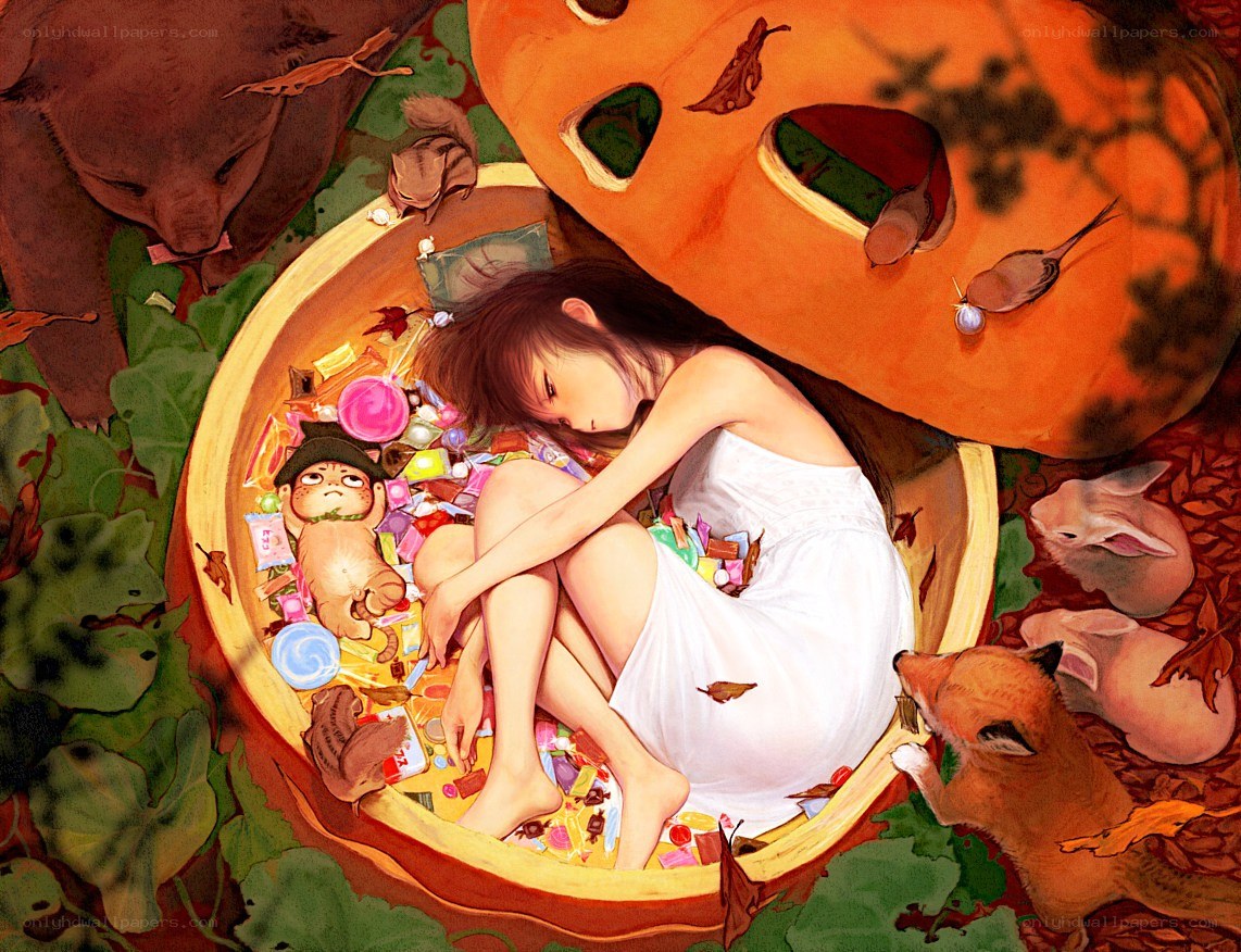 Girl sleeping in a pumpkin