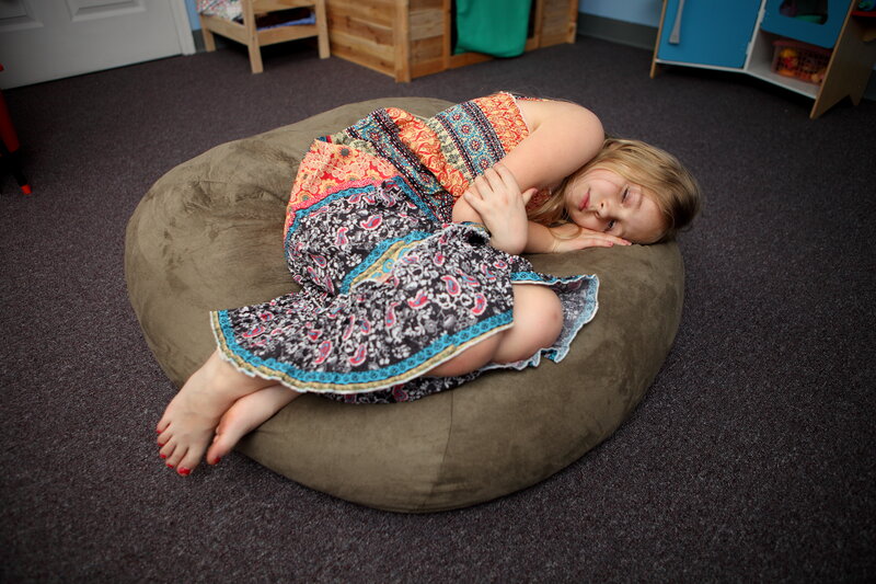 Girl Sleeping on Bean Bag