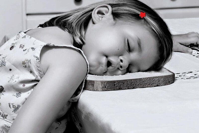 Girl Sleeping on Bread