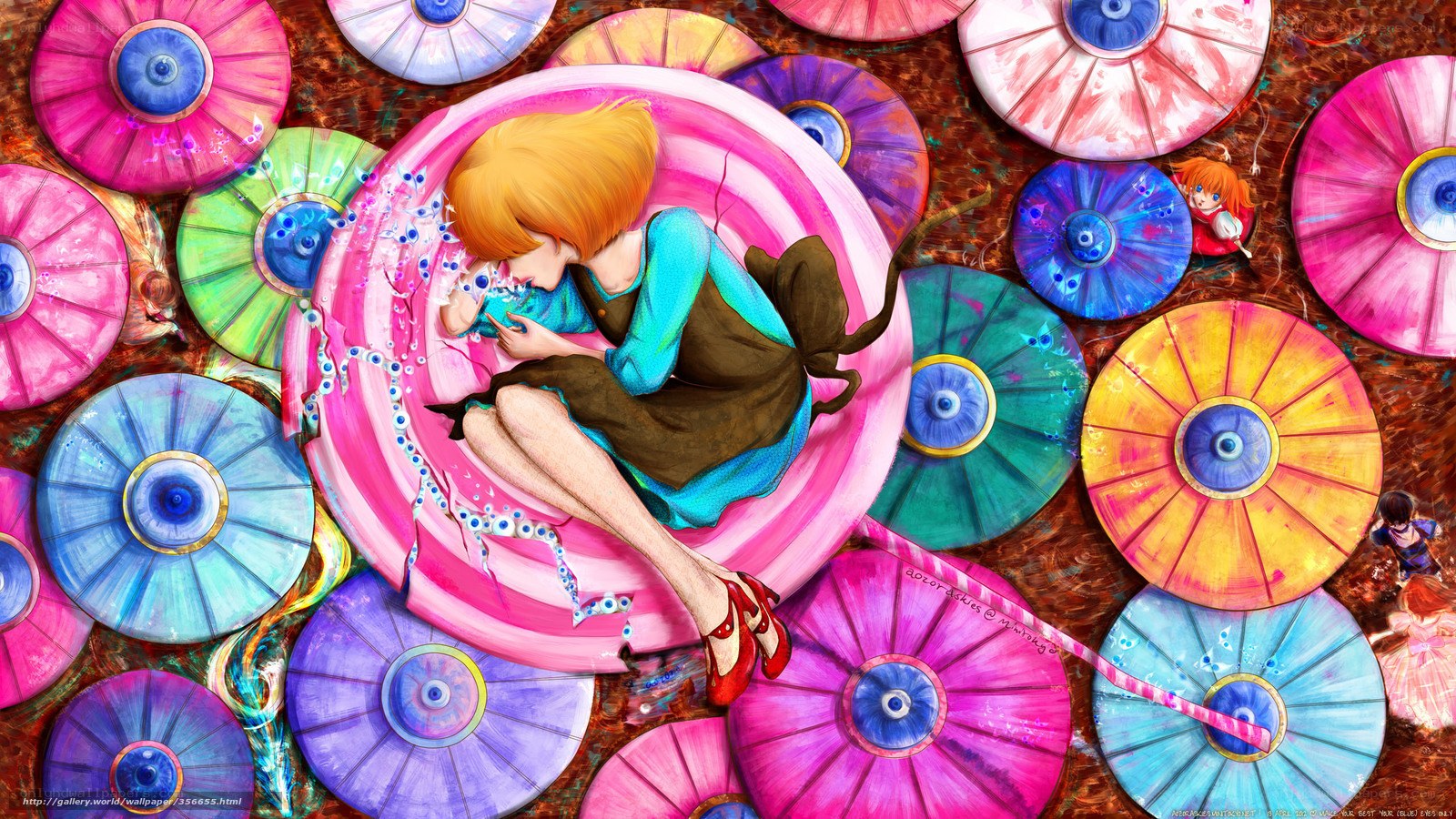 girl sleeping on colorful umbrella
