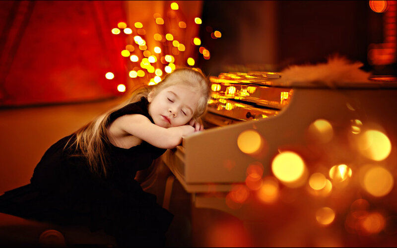 Girl Sleeping on Piano