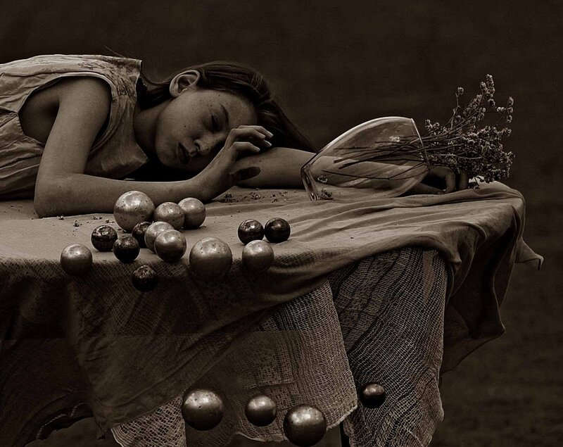 Girl Sleeping on Table