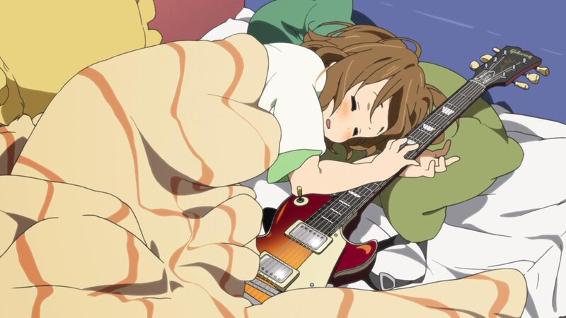girl sleeping with guitar