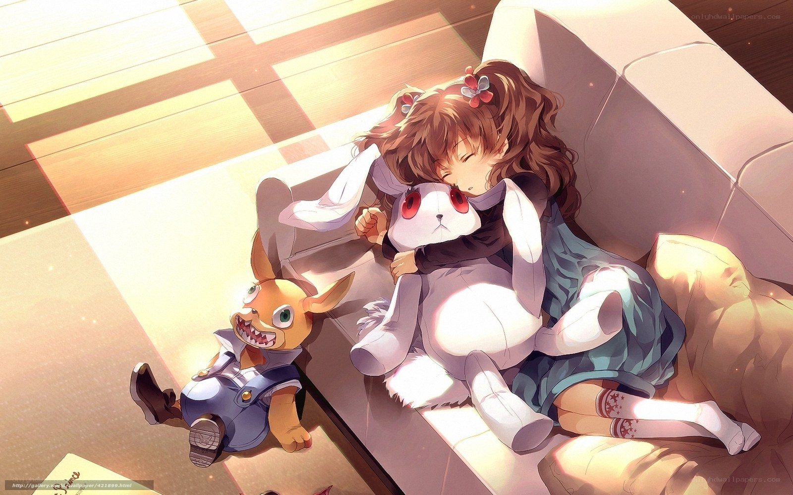 Girl sleeping with stuffed animals