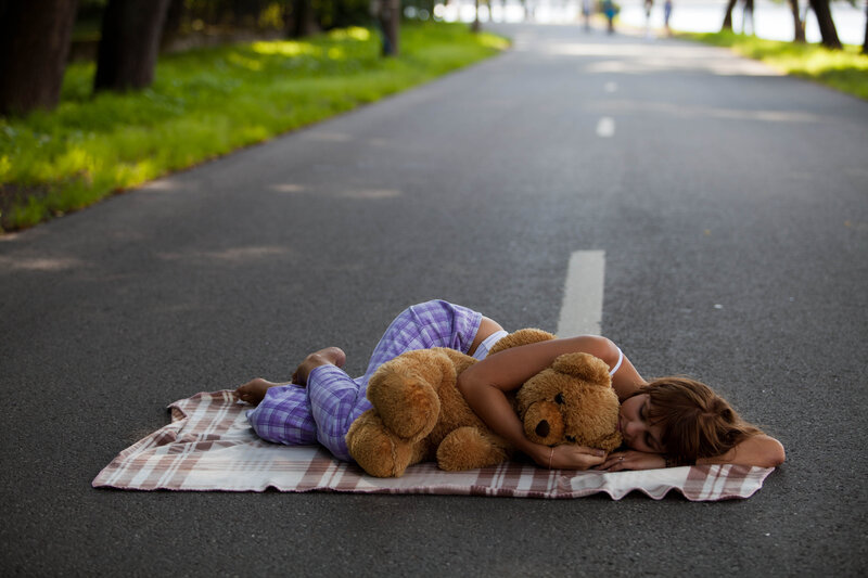 Girl Sleeping with Teddy Bear — Brown