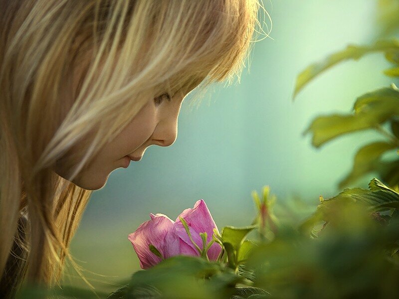 Girl Smelling Flower — Pink
