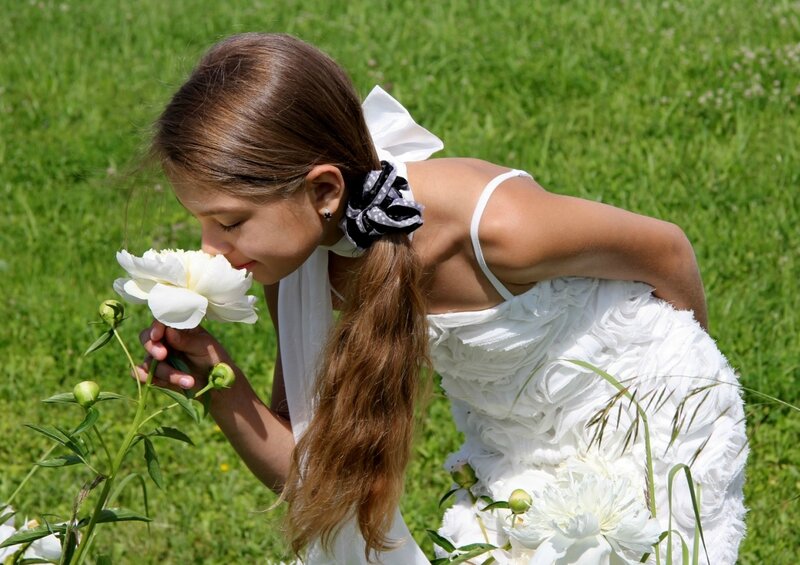 Girl Smelling Flower — White