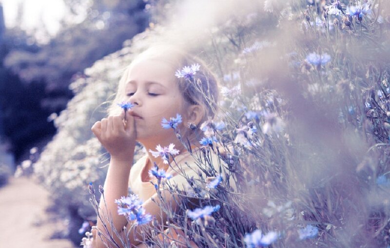 Girl Smelling Flowers — Blue
