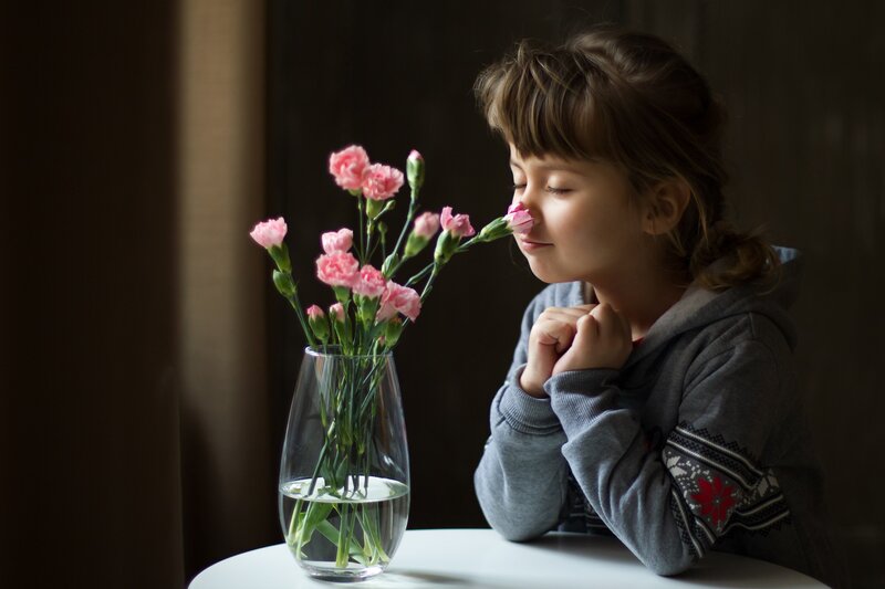 Girl Smelling Flowers — Gray, Serene