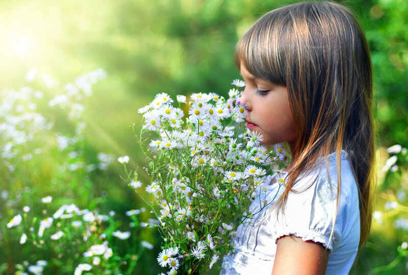 Girl Smelling Flowers — White, Serene