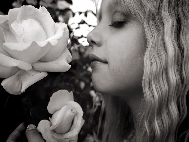 Girl Smelling Rose — Black, Serene