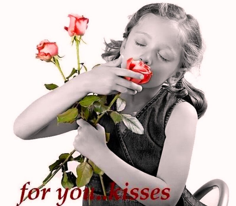 Girl Smelling Roses