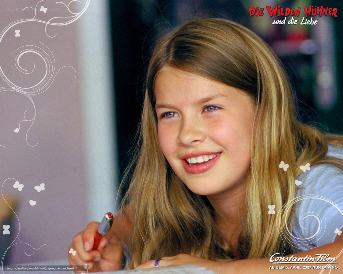 girl smiling with pen