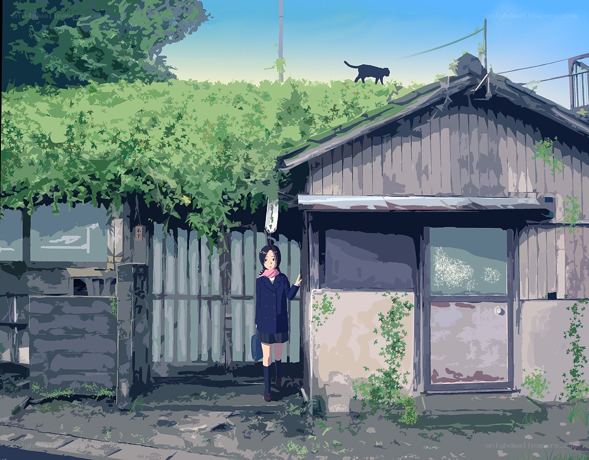 Girl standing by a house