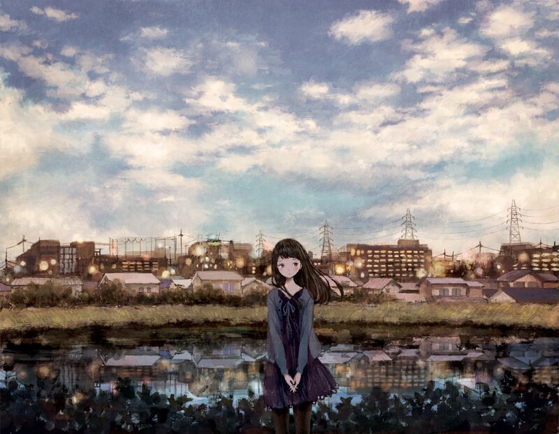 Girl standing by a river at dusk