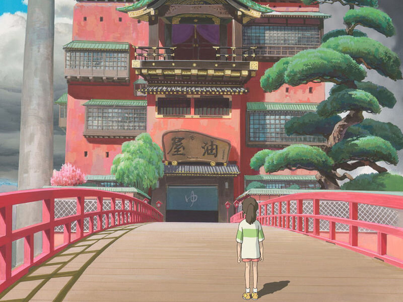 Girl standing on a bridge