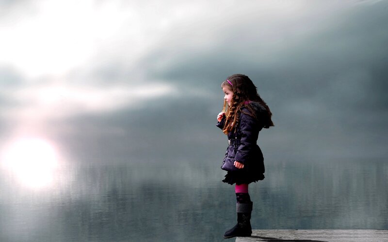 Girl Standing on Dock