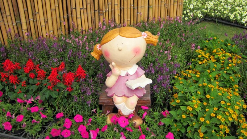 Girl Statue in Garden