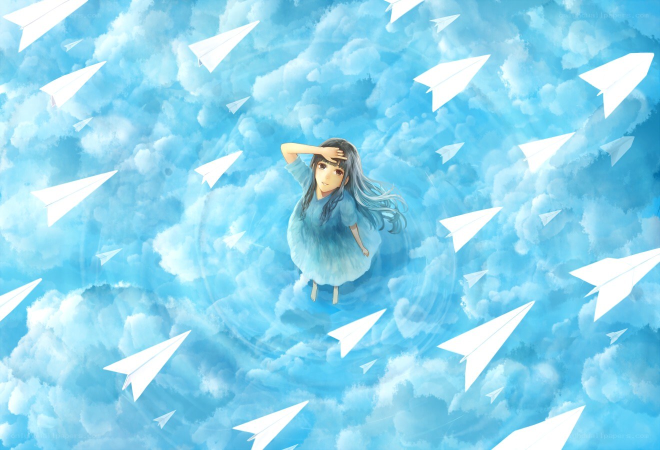 girl surrounded by paper airplanes