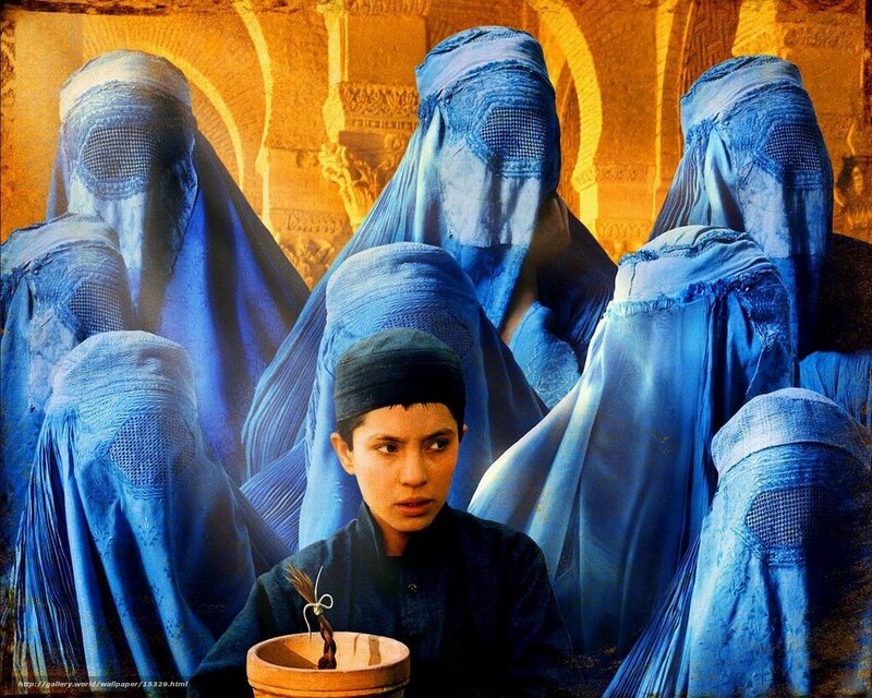 Girl surrounded by women in blue veils