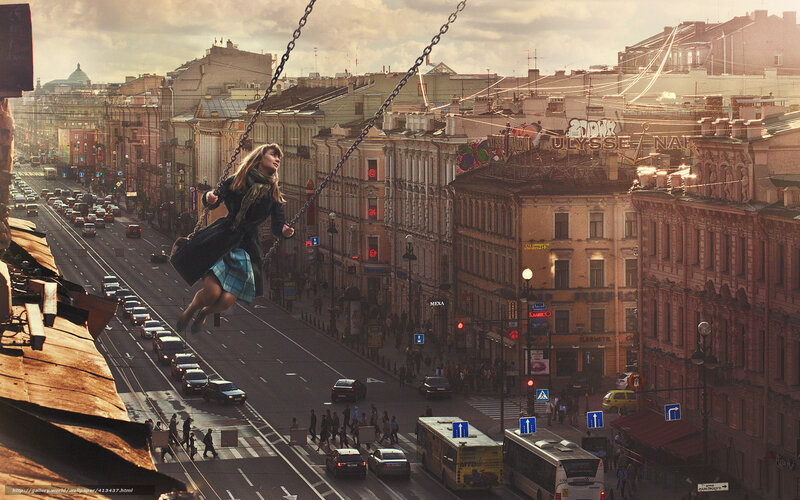 Girl swinging over city street