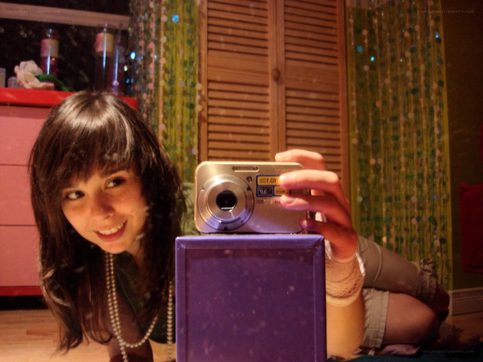 girl taking a mirror selfie