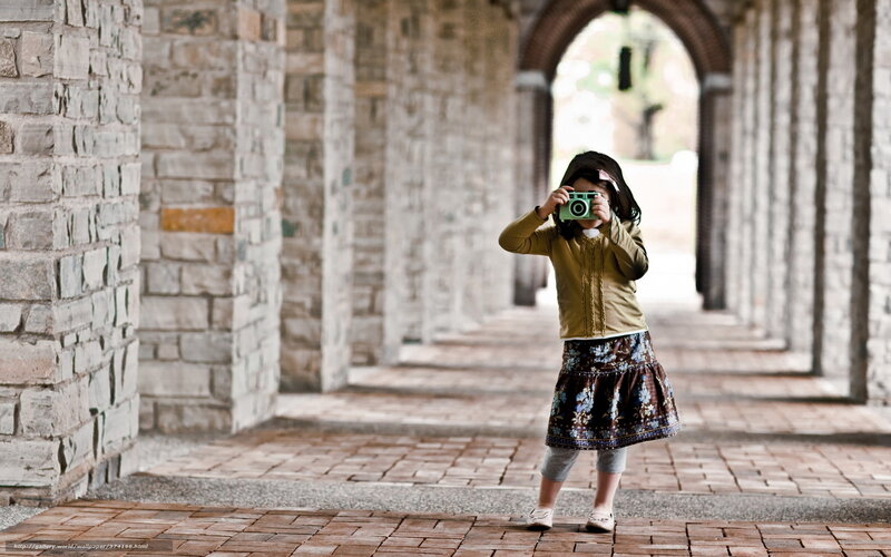 Girl Taking a Photo — Brown