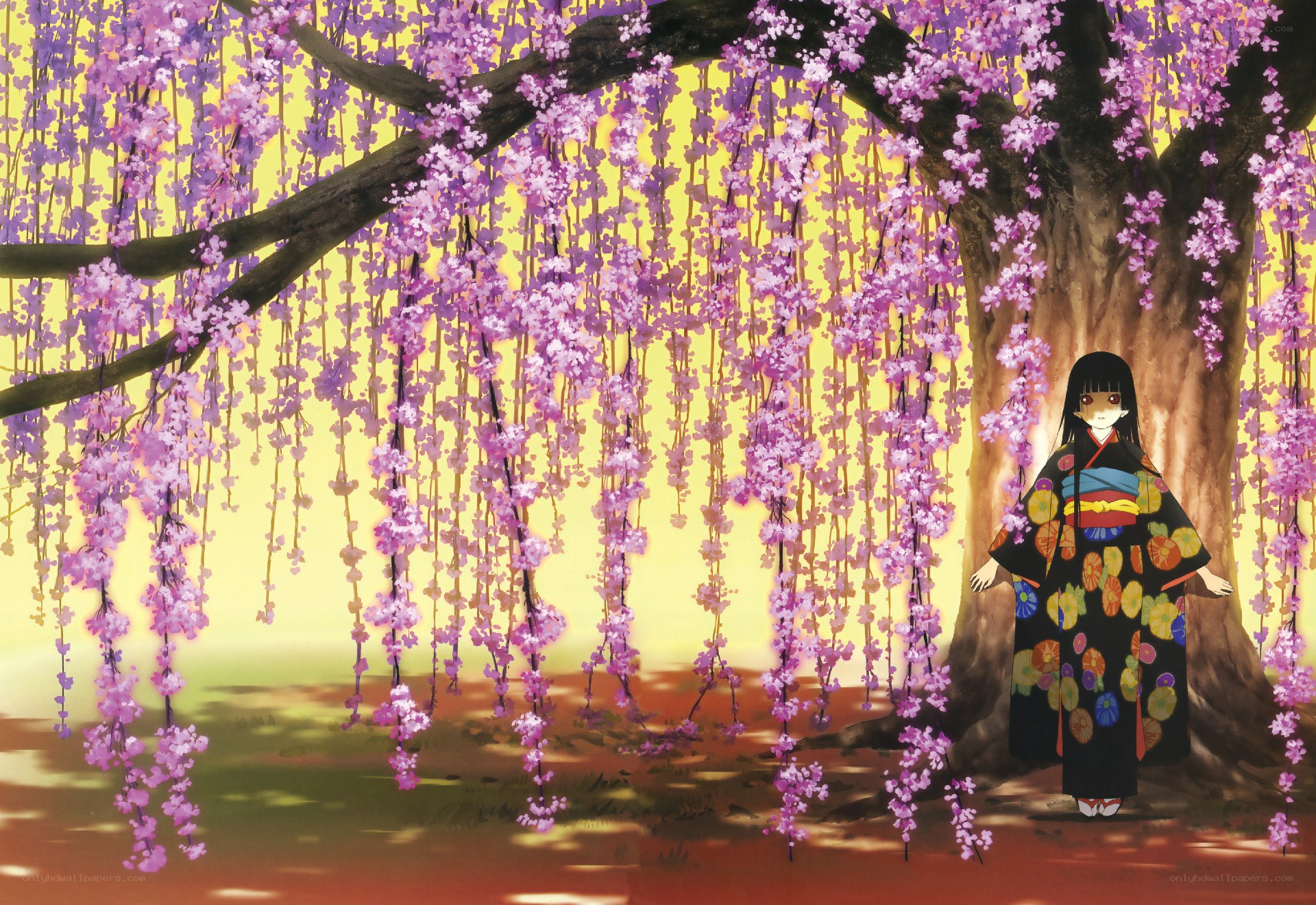 Girl under a cherry blossom tree