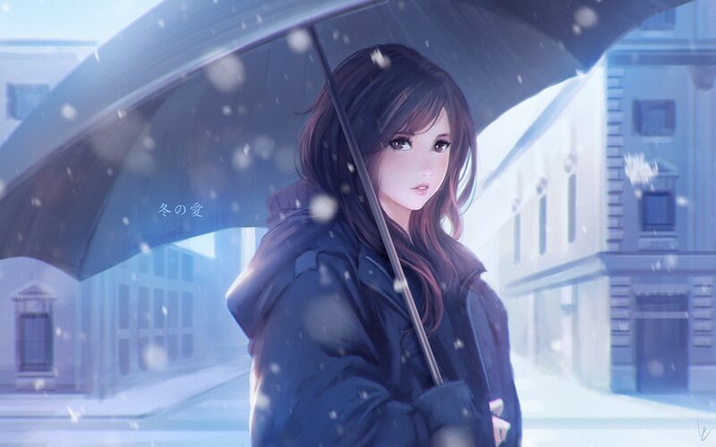 girl under umbrella in snow