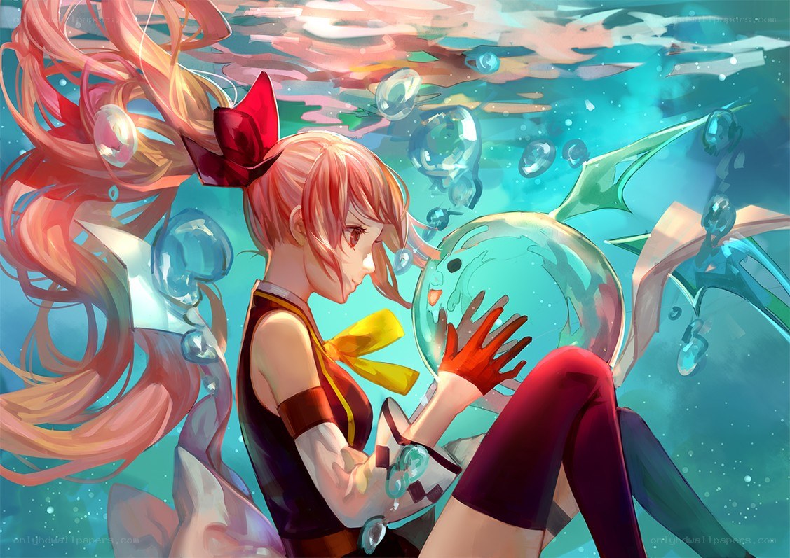 girl underwater with fish