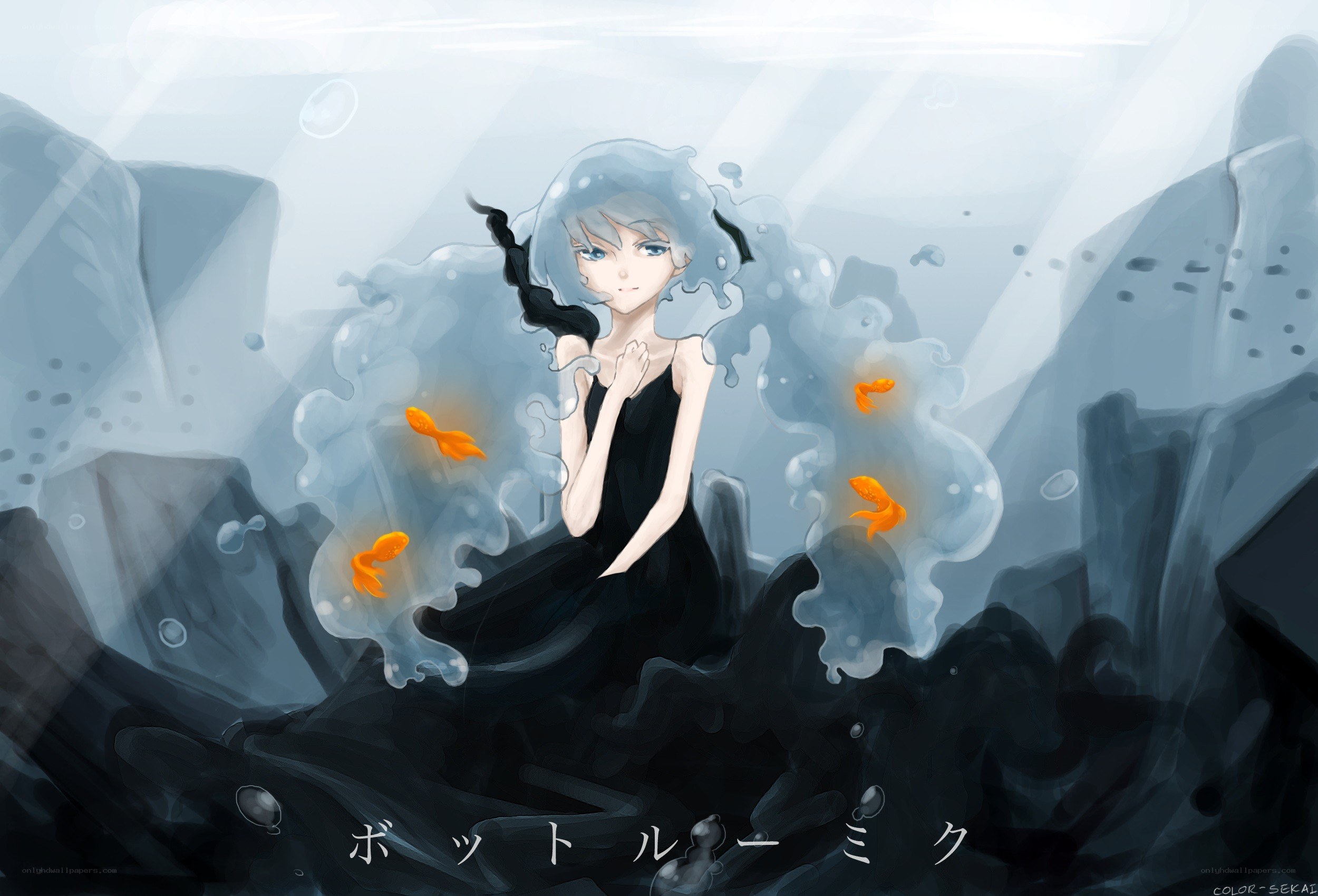 girl underwater with goldfish