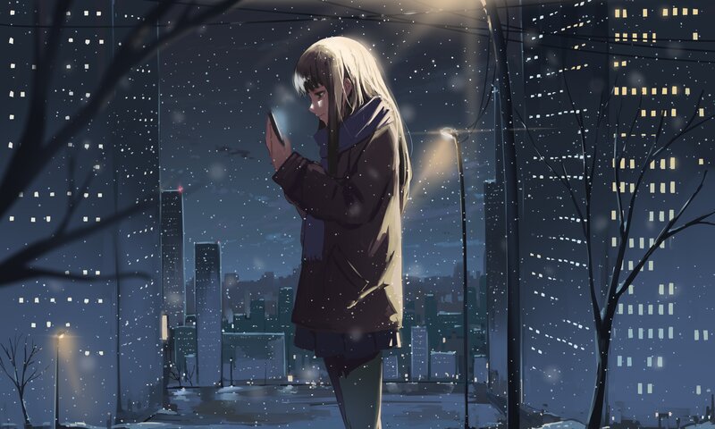 Girl Using Phone in Snow