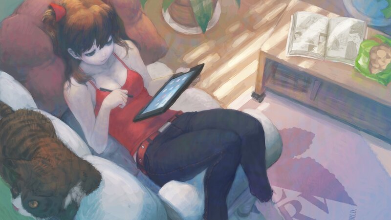 Girl using tablet on couch