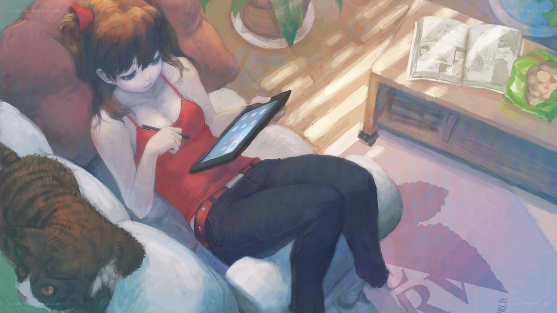 Girl using tablet on couch