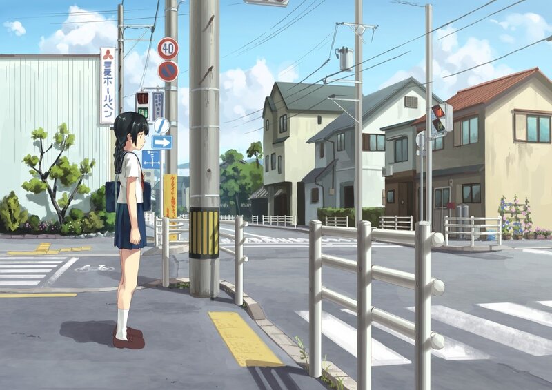 Girl waiting at a crosswalk