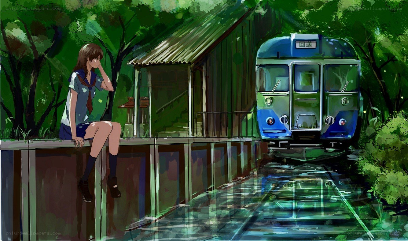 Girl waiting at a train station