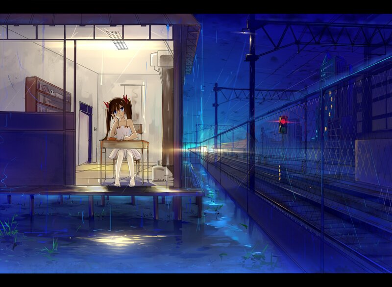 Girl waiting at a train station