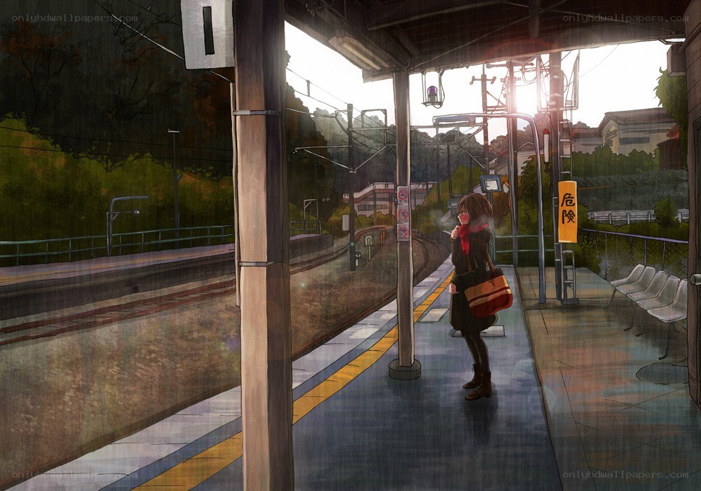 Girl waiting at train station