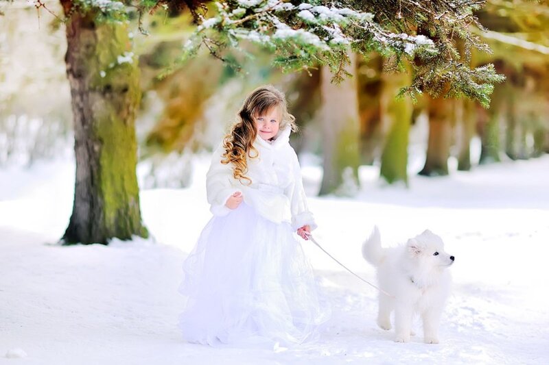 Girl Walking Dog in Snow