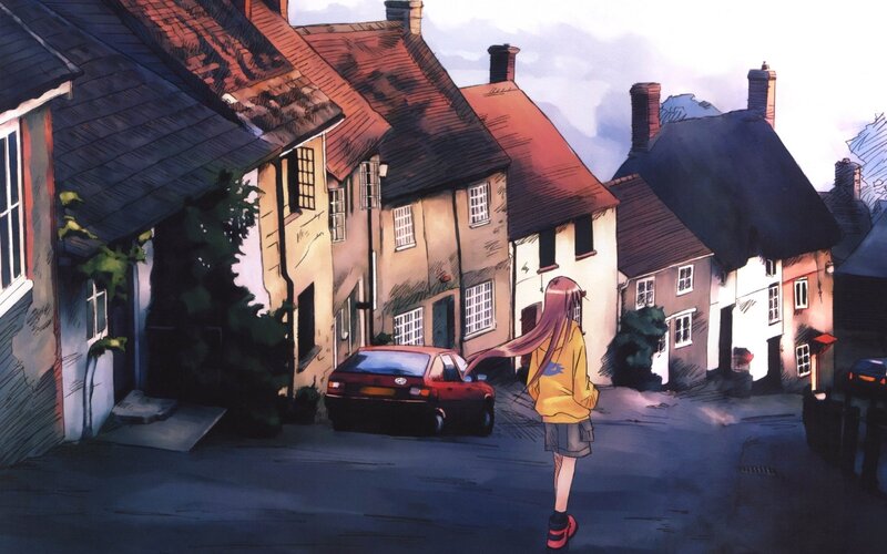 girl walking down a village street