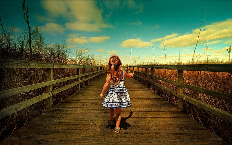 Girl Walking on Bridge — Blue