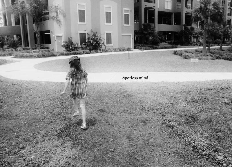 Girl Walking on Grass