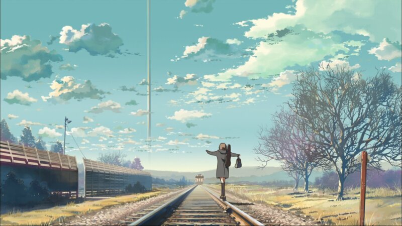Girl walking on train tracks