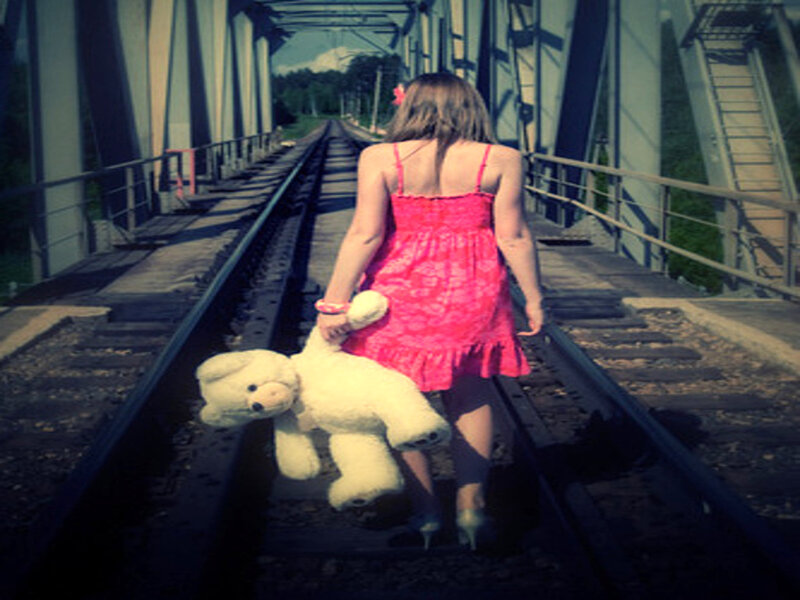 Girl Walking on Train Tracks — Pink