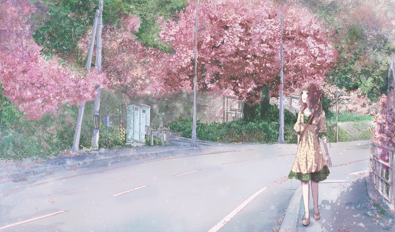 girl walking under cherry blossoms