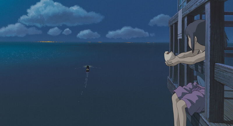 Girl watching boat at night
