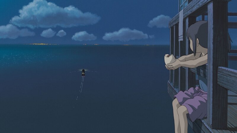 girl watching boat at night