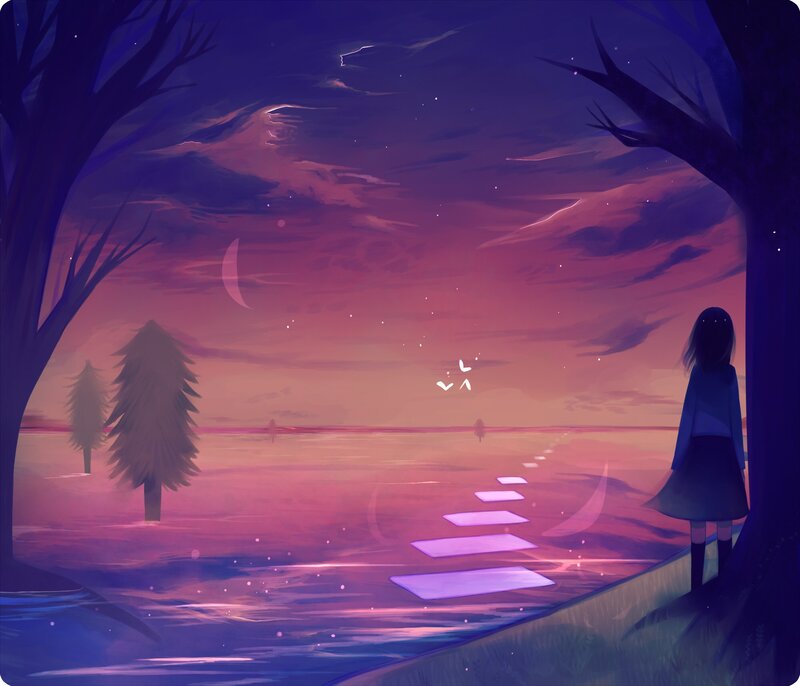 Girl watching sunset by the water